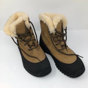 New, UGG snow boots with thick vibrant soles. 10